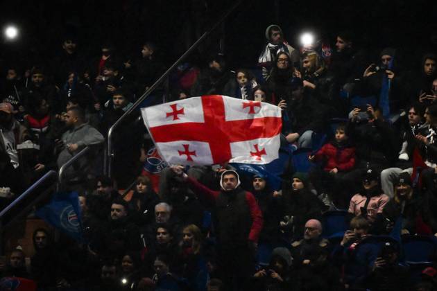 Ligue 1 PSG vs Stade de Reims - FA Paris Saint-Germain’s forward Khvicha Kvaratskhelia’s supporters hold the Georgian flag during the French L1 football match between Paris Saint-Germain and Stade de Reims at the Parc des Princes stadium in Paris on January 25, 2025. Photo by Firas Abdullah ABACAPRESS.COM Paris Île-de-France France  Copyright: xAbdullahxFiras ABACAx