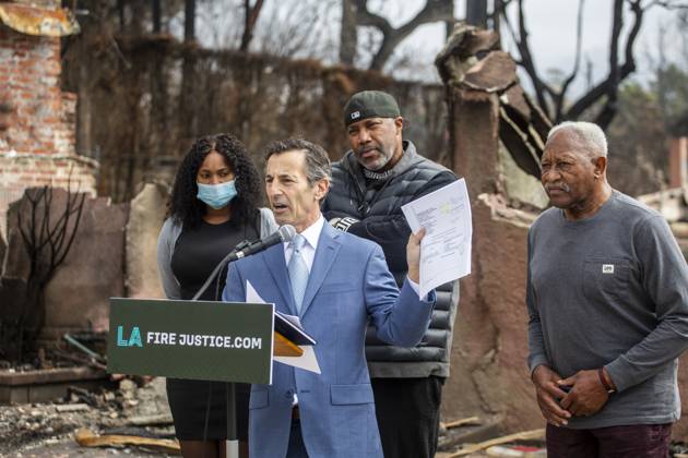 February 4, 2025, Los Angeles, California, USA: Lawyer Doug Boxer, 2nd L, speaks in a press conference held by LA Fire Justice to discuss its lawsuit against Southern California Edison on behalf of Walter Butler, R, a local shoe store operator who lost his home in the Eaton Fire. The event took place outside Butler s destroyed home in Altadena, California, on Feb. 4, 2025. Los Angeles USA - ZUMAc68_ 20250204_zaf_c68_005 Copyright: xRingoxChiux