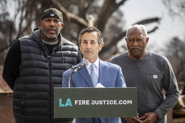 February 4, 2025, Los Angeles, California, USA: Lawyer Doug Boxer, C, speaks in a press conference held by LA Fire Justice to discuss its lawsuit against Southern California Edison on behalf of Walter Butler, L, a local shoe store operator who lost his home in the Eaton Fire. The event took place outside Butler s destroyed home in Altadena, California, on Feb. 4, 2025. Los Angeles USA - ZUMAc68_ 20250204_zaf_c68_013 Copyright: xRingoxChiux
