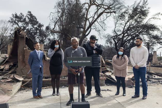 February 4, 2025, Los Angeles, California, USA: Lawyer Doug Boxer, L, Pastor BJ King, 3rd R, and Jordy Gonzalez,L, listen as Walter Butler, a local shoe store operator who lost his home in the Eaton Fire, speaks in a press conference held by LA Fire Justice to discuss its lawsuit against Southern California Edison. The event took place outside Butler s destroyed home in Altadena, California, on Feb. 4, 2025. Los Angeles USA - ZUMAc68_ 20250204_zaf_c68_001 Copyright: xRingoxChiux