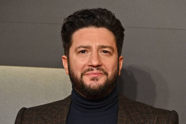John Magaro attends ˜September 5™ - UK Premiere at the Curzon Mayfair in London, England. UK. Tuesday 4th February 2025. Copyright: xJamesxWarrenx aduo4205