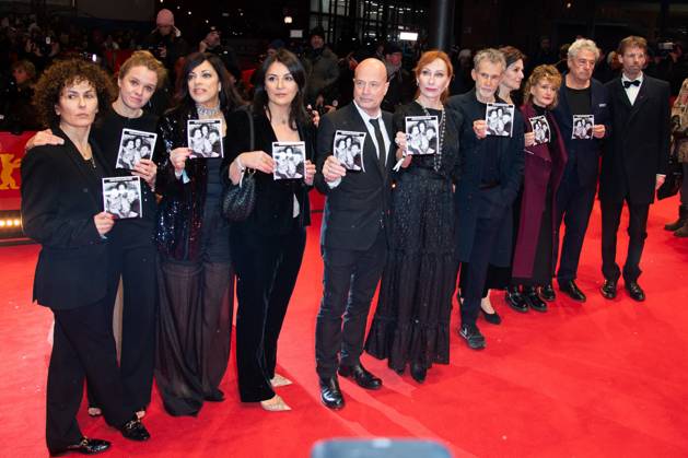Berlinale Opening Red Carpet Marie-Lou Sellem, Julia von Heinz, Alice Brauner, Duzen Tekkal, Christian Berkel, Andrea Sawatzki and Ulrich Matthes hold up signs reading Bring David Cunio Home during the Opening red carpet of the 75th Berlin International Film Festival (Berlinale) in Berlin, Germany, on February 13, 2025. Photo by Aurore Marechal ABACAPRESS.COM Berlin Germany  Copyright: xMarechalxAurore ABACAx