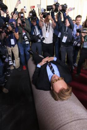 February 26, 2025, Hollywood, California, USA: Conan OÃ¢â‚¬â ¢Brien lies on the carpet during the red carpet roll out in preparation for the 97th Academy Awards at the Dolby Theater in Hollywood, California on February 26, 2025. The Academy Awards Ceremony will take place on Sunday March 2, 2025. ARIANA RUIZ BNS PI Hollywood USA - ZUMAp124 20250226_zaa_p124_007 Copyright: xArianaxRuizx