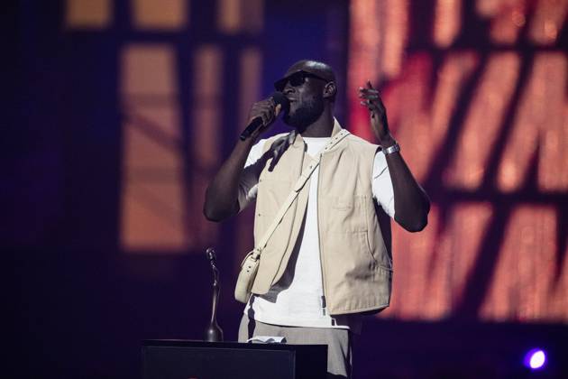 Stormzy being presented the BRIT Award for Hip Hop Grime Rap Act at the 2025 BRIT Awards at The O2 Arena, London on 1 March 2025 Stormzy being presented the BRIT Award for Hip Hop Grime Rap Act at the 2025 BRIT Awards at The O2 Arena, London on 1 March 2025 Stormzy (Michael Ebenezer Kwadjo Omari Owuo Jr.) is an English-Ghanaian rapper, singer, and songwriter. In ˜14, he gained attention on the UK underground music scene through his Wicked Skengman series of freestyles over classic grime beats. Stormzy s song Shut Up , which was initially released as a freestyle on YouTube, became popular and peaked at number eight on the UK Singles Chart., Credit:Dafydd Owen Avalon The O2, Greater London, London Copyright: xDafyddxOwenx xAvalonx 0970764310