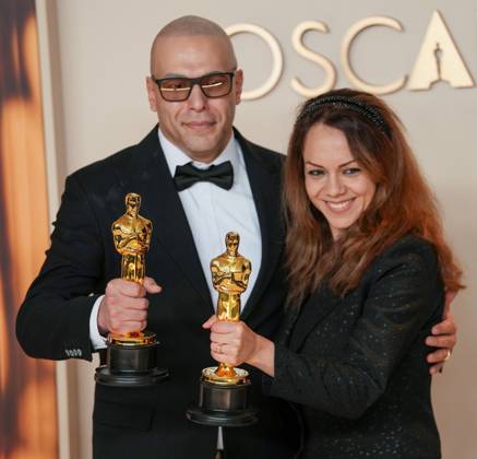 Shirin Rohani and Hossein Molayemi of In the Shadow of the Cypress celebrate their Oscar for best animated short film during the 97th Academy Awards in the Hollywood section of Los Angeles on Sunday, March 2, 2025.  LAP20250302111 PATxBENIC