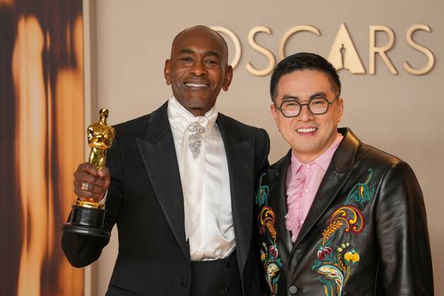 Paul Tazewell of Wicked celebrates with Academy Awards presenter Bowen Yang after Tazewell s Oscar for best costume design during the 97th Academy Awards in the Hollywood section of Los Angeles on Sunday, March 2, 2025.  LAP20250302118 PATxBENIC