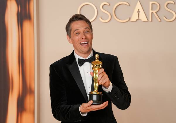 Sean Baker celebrates backstage after winning the Oscar for film editing for Anora during the 97th Academy Awards in the Hollywood section of Los Angeles on Sunday, March 2, 2025.  LAP20250302121 PATxBENIC