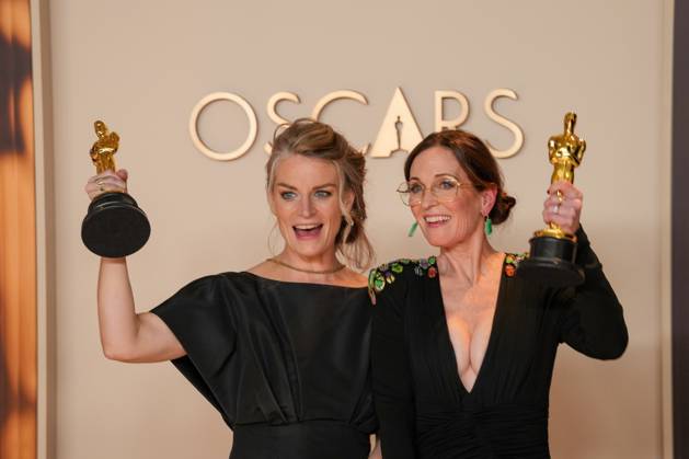 Lisa Remington and Molly O Brien of The Only Girl in the Orchestra celebrate backstage after winning the Oscar for best documentary short film during the 97th Academy Awards in the Hollywood section of Los Angeles on Sunday, March 2, 2025.  LAP20250302130 PATxBENIC