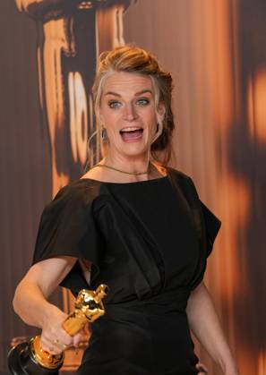 Lisa Remington of The Only Girl in the Orchestra celebrates backstage after winning the Oscar for best documentary short film during the 97th Academy Awards in the Hollywood section of Los Angeles on Sunday, March 2, 2025.  LAP20250302132 PATxBENIC