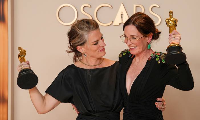 Lisa Remington and Molly O Brien of The Only Girl in the Orchestra celebrate backstage after winning the Oscar for best documentary short film during the 97th Academy Awards in the Hollywood section of Los Angeles on Sunday, March 2, 2025.  LAP20250302133 PATxBENIC