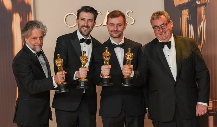 Paul Lambert, Stephen James, Rhys Salcombe, and Gerd Nefzer of Dune: Part Two celebrate backstage after winning the Oscar for best visual effects during the 97th Academy Awards in the Hollywood section of Los Angeles on Sunday, March 2, 2025.  LAP20250302138 PATxBENIC