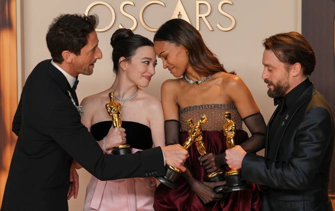 Best performance by an actor in a leading role Oscar winner Adrien Brody of The Brutalist celebrates backstage with best performance by an actress in a leading role winner Mikey Madison of Anora and best actress in a supporting role Oscar winner Zoe Saldana of Emilia Pérez with Kieran Culkin, Oscar winner for best actor in a supporting role (L-R) during the 97th Academy Awards in the Hollywood section of Los Angeles on Sunday, March 2, 2025.  LAP20250302161 PATxBENIC