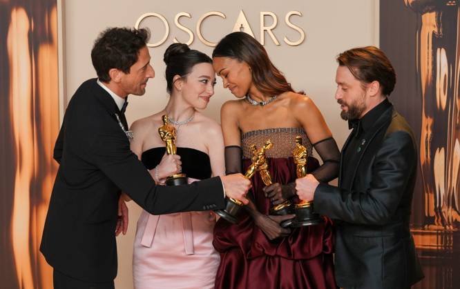 Best performance by an actor in a leading role Oscar winner Adrien Brody of The Brutalist celebrates backstage with best performance by an actress in a leading role winner Mikey Madison of Anora and best actress in a supporting role Oscar winner Zoe Saldana of Emilia Pérez with Kieran Culkin, Oscar winner for best actor in a supporting role (L-R) during the 97th Academy Awards in the Hollywood section of Los Angeles on Sunday, March 2, 2025.  LAP20250302162 PATxBENIC