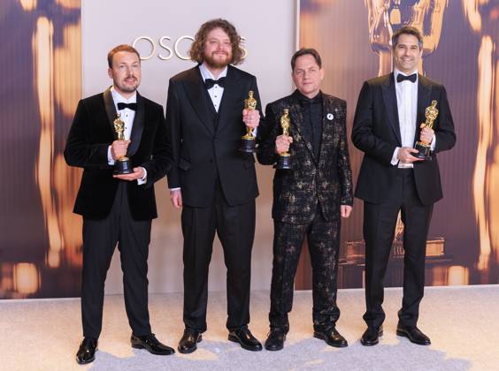 March 2, 2025, Hollywood, California, USA: (L-R) Gints Zilbalodis, MatÄ«ss KaA¾a, Ron Dyens, and Gregory Zalcman, winners of the Best Animated Feature Film for â€oeFlowâ€Â, pose in the press room of the 97th Annual Academy Awards on Sunday March 2, 2025 at the Dolby Theater in Hollywood, California. BURT HARRIS BNS PI Hollywood USA - ZUMAp124 20250302_zaa_p124_333 Copyright: xBurtxHarrisx