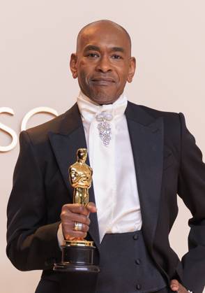 March 2, 2025, Hollywood, California, USA: Paul Tazewell, winner of the Best Costume Design award for Ã¢â‚¬oeWickedÃ¢â‚¬Â, poses in the press room of the 97th Annual Academy Awards on Sunday March 2, 2025 at the Dolby Theater in Hollywood, California. BURT HARRIS BNS PI Hollywood USA - ZUMAp124 20250302_zaa_p124_335 Copyright: xBurtxHarrisx