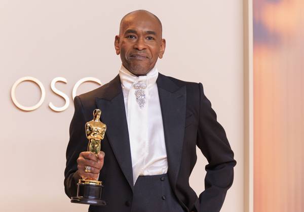 March 2, 2025, Hollywood, California, USA: Paul Tazewell, winner of the Best Costume Design award for Ã¢â‚¬oeWickedÃ¢â‚¬Â, poses in the press room of the 97th Annual Academy Awards on Sunday March 2, 2025 at the Dolby Theater in Hollywood, California. BURT HARRIS BNS PI Hollywood USA - ZUMAp124 20250302_zaa_p124_338 Copyright: xBurtxHarrisx