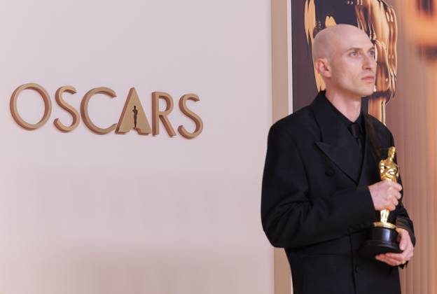 March 2, 2025, Hollywood, California, USA: Daniel Blumberg, winner of the Best Original Score for Ã¢â‚¬oeThe BrutalistÃ¢â‚¬Â, poses in the press room of the 97th Annual Academy Awards on Sunday March 2, 2025 at the Dolby Theater in Hollywood, California. BURT HARRIS BNS PI Hollywood USA - ZUMAp124 20250302_zaa_p124_420 Copyright: xBurtxHarrisx