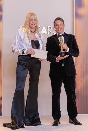 March 2, 2025, Hollywood, California, USA: Sean Baker (R), winner of the Best Film Editing for Ã¢â‚¬oeAnoraÃ¢â‚¬Â, and Daryl Hannah (L) pose in the press room of the 97th Annual Academy Awards on Sunday March 2, 2025 at the Dolby Theater in Hollywood, California. BURT HARRIS BNS PI Hollywood USA - ZUMAp124 20250302_zaa_p124_463 Copyright: xBurtxHarrisx