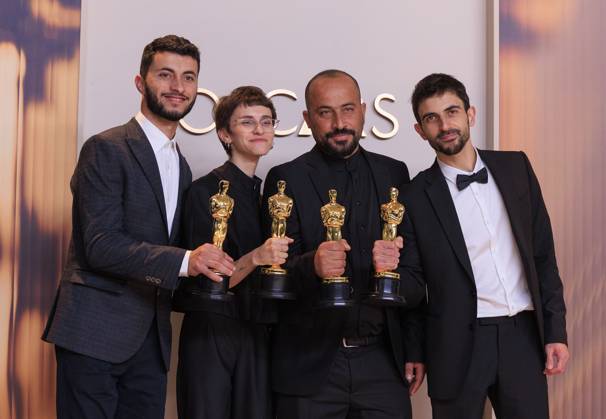 March 2, 2025, Hollywood, California, USA: (L-R) Yuval Abraham, Rachel Szor, Hamdan Ballal, Basel Adra, winners of the Best Documentary Feature Film for Ã¢â‚¬oeNo Other LandÃ¢â‚¬Â, pose in the press room of the 97th Annual Academy Awards on Sunday March 2, 2025 at the Dolby Theater in Hollywood, California. BURT HARRIS BNS PI Hollywood USA - ZUMAp124 20250302_zaa_p124_524 Copyright: xBurtxHarrisx