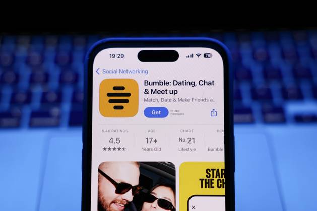 Top Apps Photo Illustrations A laptop keyboard and Bumble on App Store displayed on a phone screen are seen in this illustration photo taken in Krakow, Poland on March 17, 2025. Krakow Poland  Copyright: xJakubxPorzyckix originalFilename: porzycki-topappsp250317_npmTI.jpg