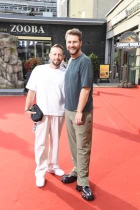 Maurice Gajda with husband Mitch Barg at the premiere of JURASSIC WORLD DIE WIEDERGEBURT at the ZOO Palast in Berlin on 18 06 2025