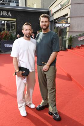 Maurice Gajda with husband Mitch Barg at the premiere of JURASSIC WORLD DIE WIEDERGEBURT at the ZOO Palast in Berlin on 18 06 2025