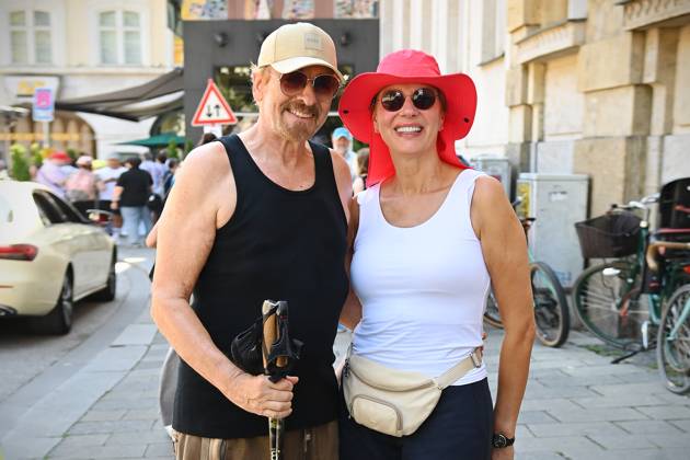 While strolling in Munich Thomas GOTTSCHALK caught with his wife Karina in a muscle shirt and with Nordic Walking sticks on the Promenadeplatz ZDF Reception Get Totgether Orange Hour in Hugo s Bar on the occasion of Filmfest Muenchen on 01 07 2025
