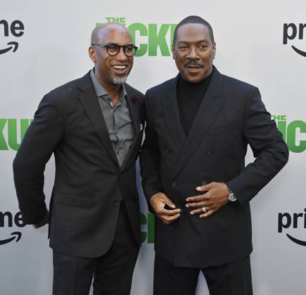 Director Tim Story (L) and cast member Eddie Murphy attend the premiere of the motion picture comedy The Pickup at Regal LA Live in Los Angeles on Sunday, July 27, 2025. Storyline: A routine cash pickup turns into a deadly pursuit when two mismatched armored truck drivers are ambushed by ruthless criminals with plans beyond the cash.  LAP2025072744 JIMxRUYMEN