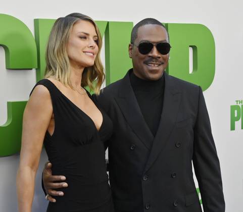 Cast member Eddie Murphy and his wife Paige Butcher attend the premiere of the motion picture comedy The Pickup at Regal LA Live in Los Angeles on Sunday, July 27, 2025. Storyline: A routine cash pickup turns into a deadly pursuit when two mismatched armored truck drivers are ambushed by ruthless criminals with plans beyond the cash.  LAP2025072748 JIMxRUYMEN