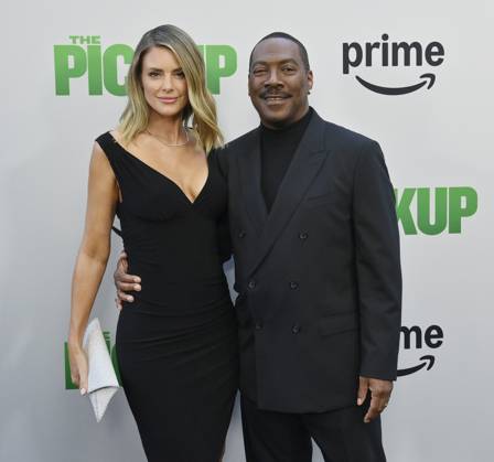 Cast member Eddie Murphy and his wife Paige Butcher attend the premiere of the motion picture comedy The Pickup at Regal LA Live in Los Angeles on Sunday, July 27, 2025. Storyline: A routine cash pickup turns into a deadly pursuit when two mismatched armored truck drivers are ambushed by ruthless criminals with plans beyond the cash.  LAP2025072701 JIMxRUYMEN