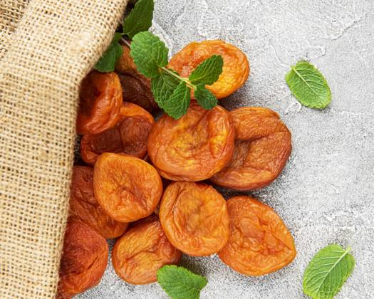 Dried apricots on a grey concrete background Model Released OlenaRudo_ID30936_1049467_092 Copyright: xx