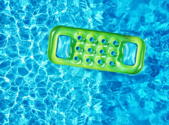 Inflatable mattress in swimming pool From above drone view of bright green inflatable mattress floating on blue water surface of swimming pool in sunlight in summertime, 64540620.jpg RECORD DATE NOT STATED