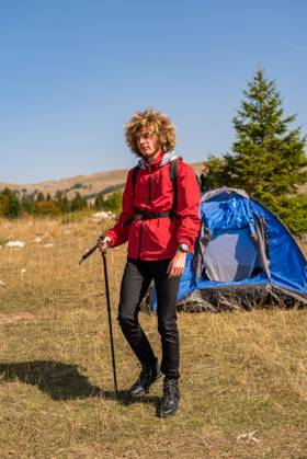 A male hiker solo camping and hiking in the mountain forest adventure travel. A male hiker solo camping and hiking in the mountain forest adventure travel. High quality photo, model released, , 95976000.jpg RECORD DATE NOT STATED