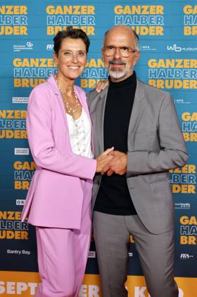 Actor Christoph Maria Herbst and his wife Gisi Herbst at the premiere of the movie Ganzer Halber Bruder at Cinedom Cologne Cologne, 15 09 2025 NRW Germany Copyright: xChristophxHardtx