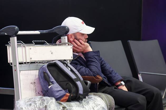 RUSSIA, MOSCOW REGION - SEPTEMBER 17, 2025: A man dozes off at Sheremetyevo International Airport. Sofya Sandurskaya TASS  84064014