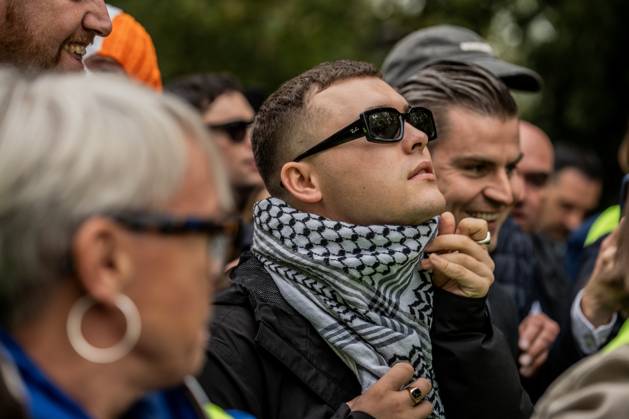 September 26, 2025, London, United Kingdom: Mo Chara of Belfast rap group Kneecap emerges jubilant from Woolwich Crown Court having been acquitted of terror charges, flanked by fellow band members DJ Provai and Moglai Bap. The 27 year old (real name Liam Og O hAnnaidh) was acquitted of all charges. Hundreds of Kneecap supporters and pro-Palestinian protesters were present to oppose the charge and to celebrate his acquittal. London United Kingdom - ZUMAs197 20250926_aaa_s197_202 Copyright: xLabxKyxMox