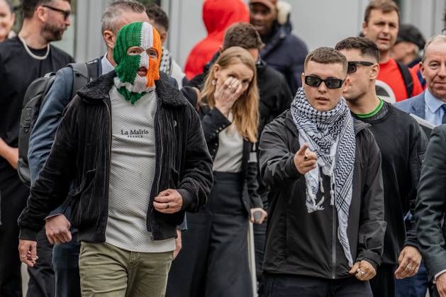 September 26, 2025, London, United Kingdom: Mo Chara of Belfast rap group Kneecap emerges jubilant from Woolwich Crown Court having been acquitted of terror charges, flanked by fellow band members DJ Provai and Moglai Bap. The 27 year old (real name Liam Og O hAnnaidh) was acquitted of all charges. Hundreds of Kneecap supporters and pro-Palestinian protesters were present to oppose the charge and to celebrate his acquittal. London United Kingdom - ZUMAs197 20250926_aaa_s197_215 Copyright: xLabxKyxMox