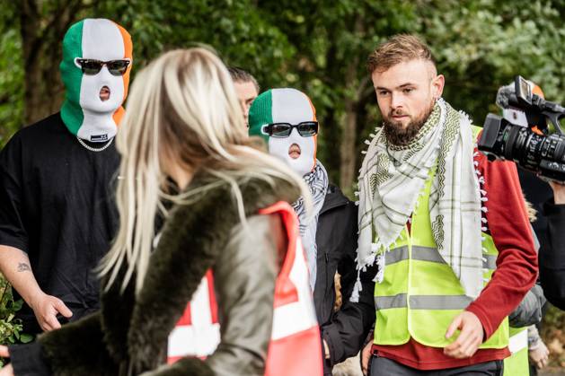 September 26, 2025, London, United Kingdom: Mo Chara (centre) of Belfast rap group Kneecap arrives at Woolwich Crown Court accused of terror charges for displaying a flag in support of Hezbollah at a gig in London. The 27 year old (real name Liam Og O hAnnaidh) was acquitted of all charges. Hundreds of Kneecap supporters and pro-Palestinian protesters were present to oppose the charge and to celebrate his acquittal. London United Kingdom - ZUMAs197 20250926_aaa_s197_220 Copyright: xLabxKyxMox