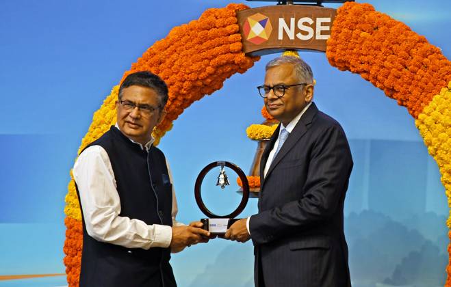 October 13, 2025, Mumbai, India: L-R Ashish Kumar Chauhan, Managing Director (MD) and Chief Executive Officer (CEO) of National Stock Exchange (NSE) gives a memento to Natarajan Chandrasekaran, Chairman of Tata Sons during the Initial Public Offer (IPO) listing ceremony at the National Stock Exchange (NSE) in Mumbai. Mumbai India - ZUMAs197 20251013_aaa_s197_004 Copyright: xAshishxVaishnavx