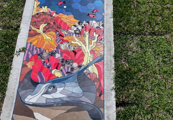 October 13, 2025, St. Petersburg, Florida, USA: An aerial drone view of The Sunshine City Mosaic sidewalk mural at Sunset Park, 7340 Central Ave, on Monday, Oct. 13, 2025 in St. Petersburg. The 175 foot long side walk mural is the largest in the Southeast. St. Petersburg USA - ZUMAs70_ 20251013_zan_s70_051 Copyright: xDirkxShaddx