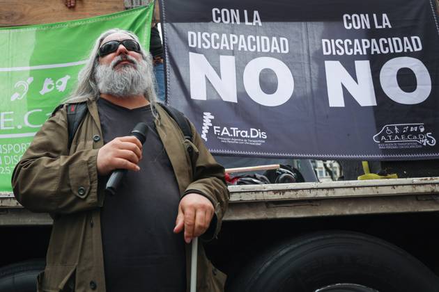 October 22, 2025, Buenos Aires, Buenos Aires, Argentina: A blind man waits to give a speech near the National Ministry of Health during the demonstration calling for enforcement of the Disability Emergency Law. Buenos Aires Argentina - ZUMAp265 20251022_zip_p265_009 Copyright: xDelfinaxCorberaxPix