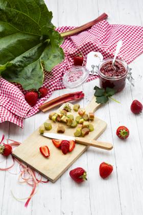 Strawberry and rhubarb jam with fresh ingredients on wood, LVF09554