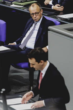 L R Friedrich Merz CDU , Federal Chancellor, and Pascal Reddig, Member of the German Bundestag CDU and Chairman of the Young Group of the CDU CSU, recorded during the debate on the pension package in the German Bundestag in Berlin, 05 12 2025 The Young Group of the CDU CSU parliamentary group threatens to reject the package, which could lead to a cri Copyright: xFlorianxGaertnerx