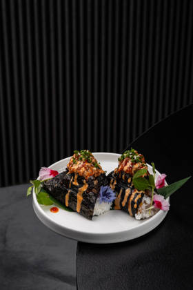 IMAGO Creative, Food, Japan, Onigiri Onigiri with fish filling, drizzled with sauce Warsaw, Masovian Voivodeship, Poland R_ORVG251214-1899144-01
