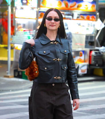 Lola Tung out in New York Actress Lola Tung is doing a photo op front of the Foot Locker store in Times Square, New York on December 16, 2025. Photo by Dylan Travis ABACAPRESSCOM New York NY  Copyright: xDylanxTravis ABACAx