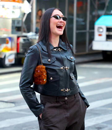 Lola Tung out in New York Actress Lola Tung is doing a photo op front of the Foot Locker store in Times Square, New York on December 16, 2025. Photo by Dylan Travis ABACAPRESSCOM New York NY  Copyright: xDylanxTravis ABACAx
