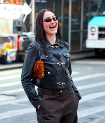 Lola Tung out in New York Actress Lola Tung is doing a photo op front of the Foot Locker store in Times Square, New York on December 16, 2025. Photo by Dylan Travis ABACAPRESSCOM New York NY  Copyright: xDylanxTravis ABACAx