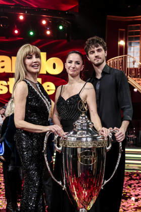 December 21, 2025, Rome, Rome, Italy: Dancing with the Stars television show, the finale. Pictured: Milly Carlucci with Andrea Delogu and Nikita Perotti, the winners. Rome, Italy 20 December 2025 Rome Italy  - ZUMAa289 20251221_zia_a289_020 Copyright: xCristianoxMinichiellox