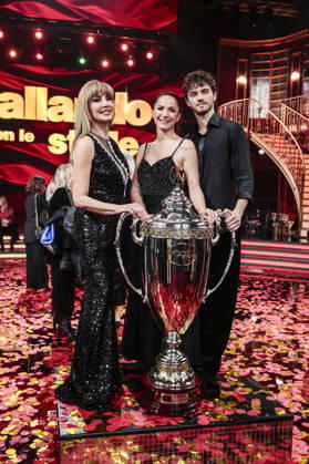 December 21, 2025, Rome, Rome, Italy: Dancing with the Stars television show, the finale. Pictured: Milly Carlucci with Andrea Delogu and Nikita Perotti, the winners. Rome, Italy 20 December 2025 Rome Italy  - ZUMAa289 20251221_zia_a289_019 Copyright: xCristianoxMinichiellox