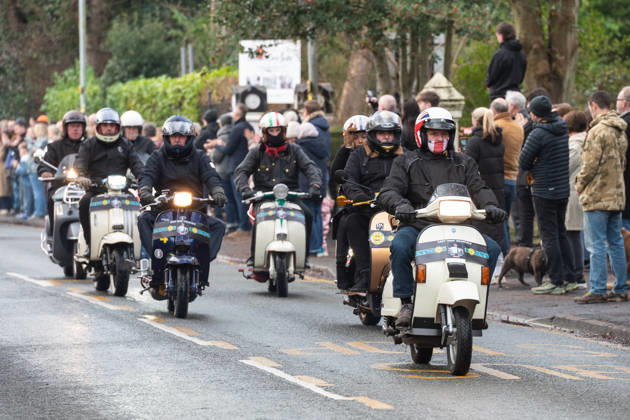 Scooter riders lead the funeral procession of Gary Mani Mounfield, Bass Player in the Stone Roses and Primal Scream, makes its way through Heaton Moor, Stockport on 22 December 2025. 22 12 2025 Stockport Greater Manchester England Heaton Moor  Copyright: xMattxWilkinsonx